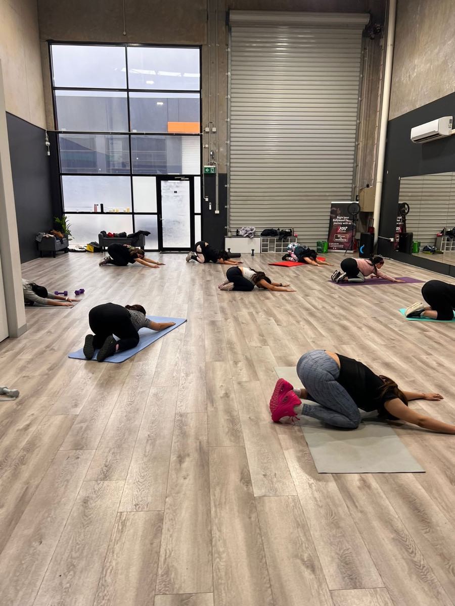 BollyFit members cooling down together after class